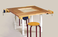 Click to Enlarge - Adjustable Height Well Top Workbench (Shown with vices and chairs sold separately)